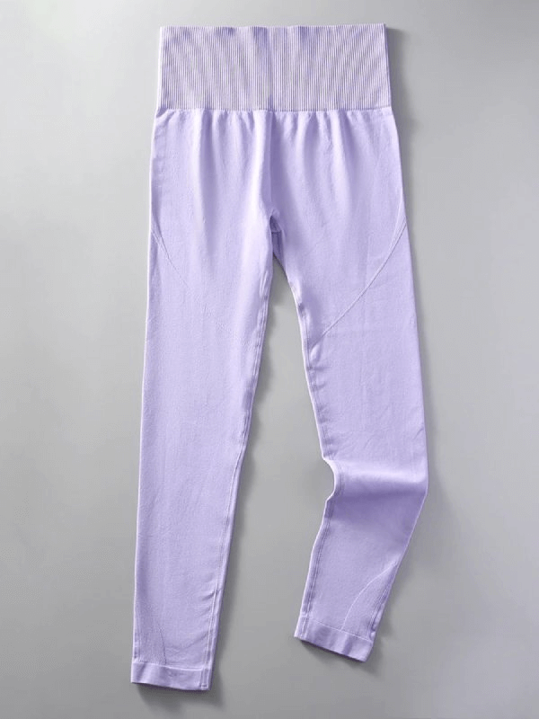 Lilac women's seamless high waist yoga leggings with elastic waist, made of nylon and spandex for comfort and flexibility.